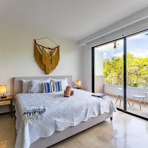 https://menesse-apartments.tulum-hotels.net